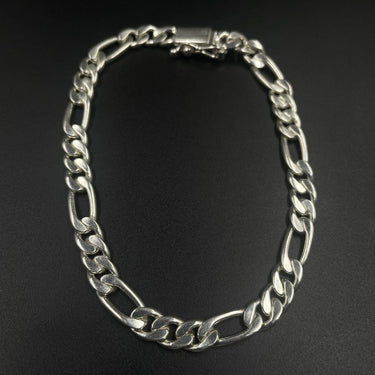 Pack Anillo labrado y Pulsera Fígaro de Plata 950